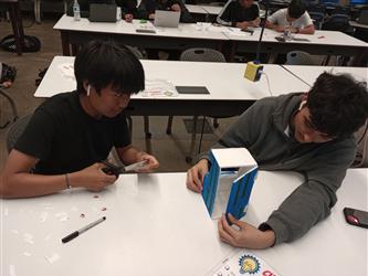 2 students painting