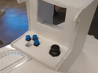 A mini arcade cabinet